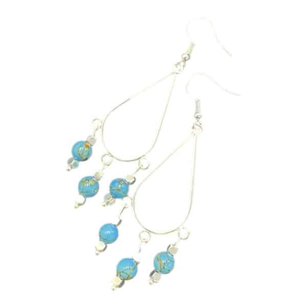 Bright blue teardrop earrings handmade by Art in Stone — the Blue Lagoon Drops capture the sparkle of sunshine on tropical water.