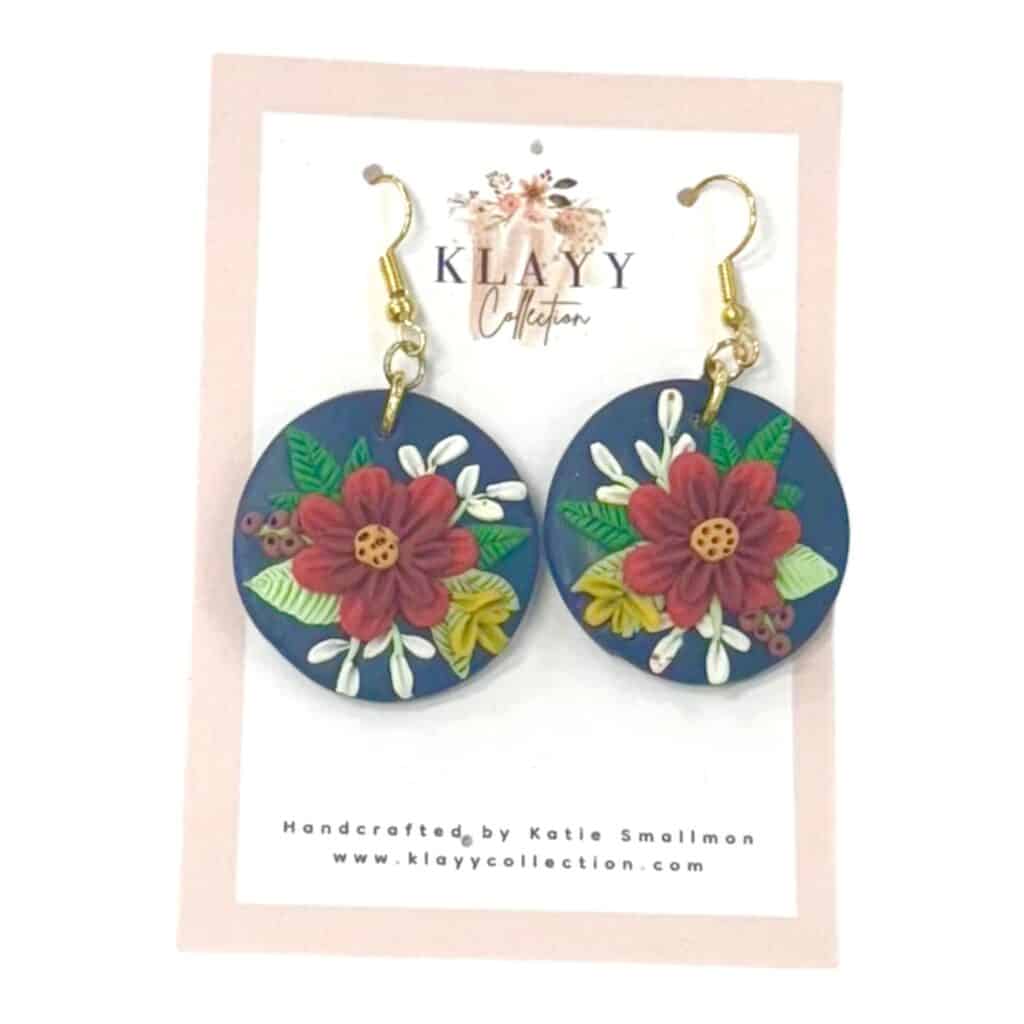 Handmade Crimson Bloom Earrings by Klayy Collection — navy and red floral polymer clay earrings with timeless handcrafted beauty.