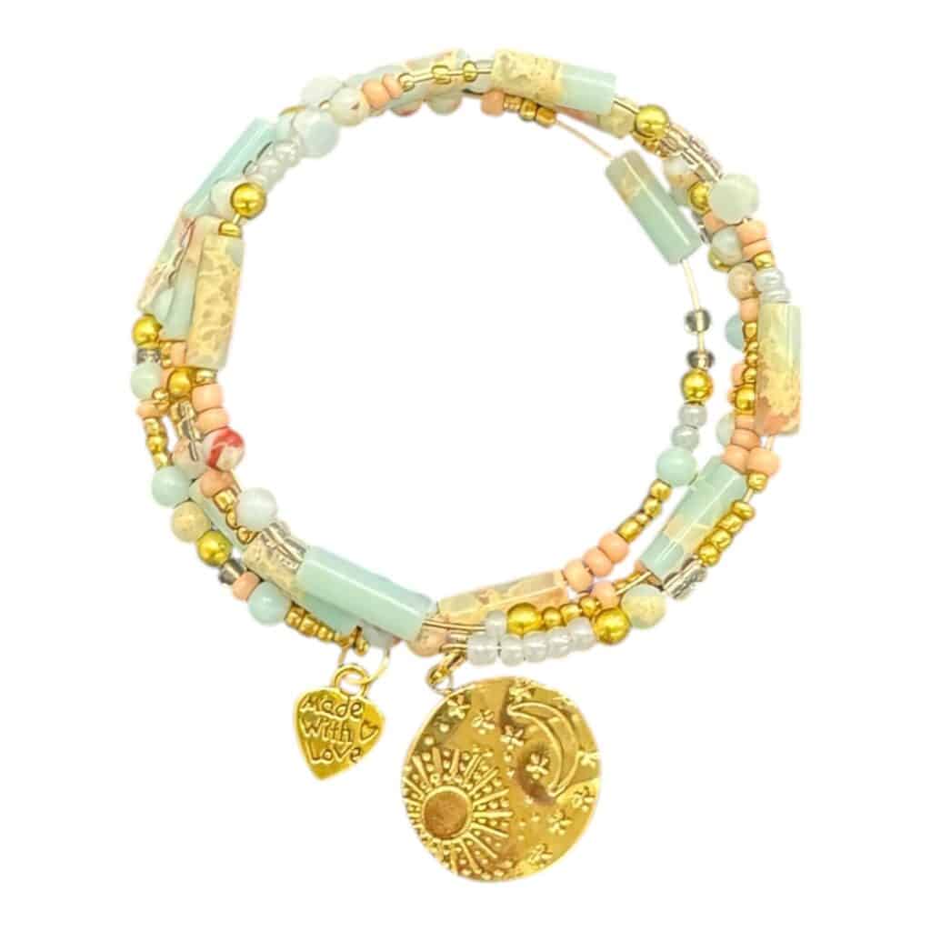 Balance light and shadow with the Sun and Moon Dreams Bracelet — soft hues, celestial charms, and golden glow for dreamers.