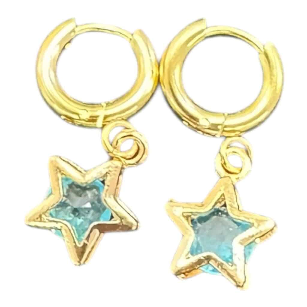 Shine bright with the Wish Upon a Star Huggies — gold hoops with aqua-blue crystal stars for a hint of everyday magic and sparkly fun!