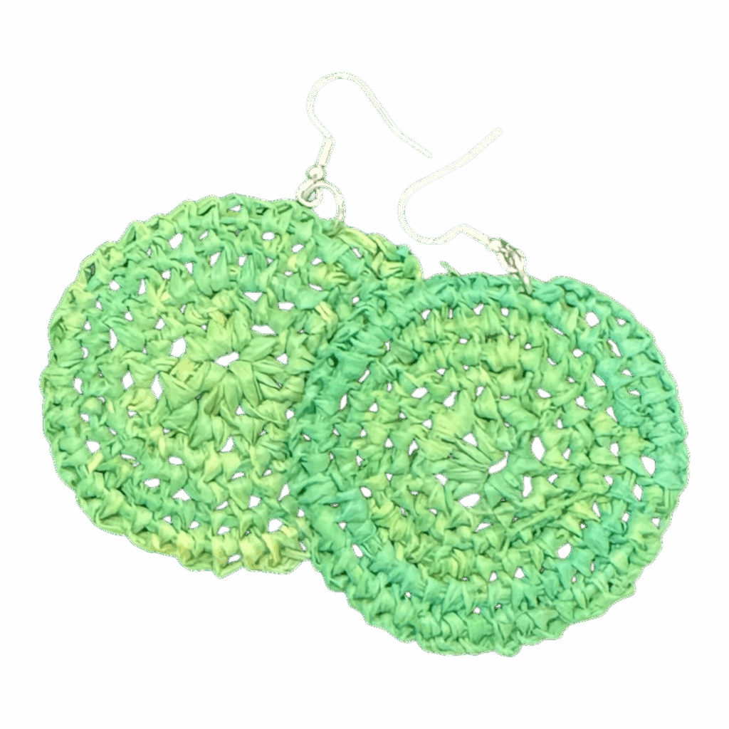 Soft green raffia earrings by Gomeroi artist Debbie Wood. Lightweight Indigenous handmade jewellery. Shop unique Australian earrings.