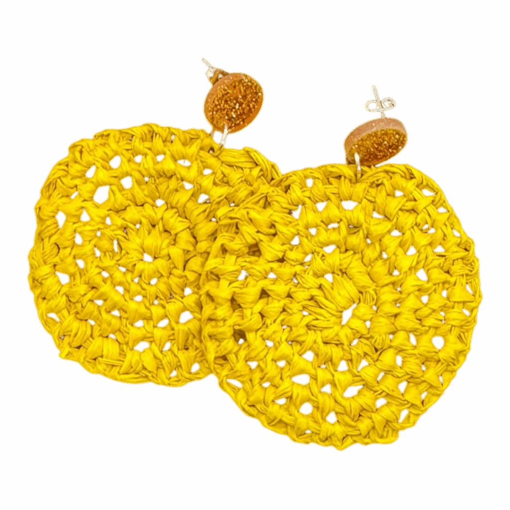 Handwoven golden raffia earrings with ochre studs by Gomeroi artist Debbie Wood. Lightweight cultural jewellery.